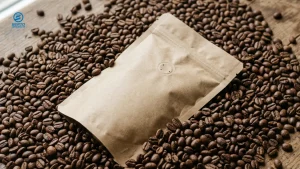 Coffee bag packaging lying on a background of roasted coffee beans.