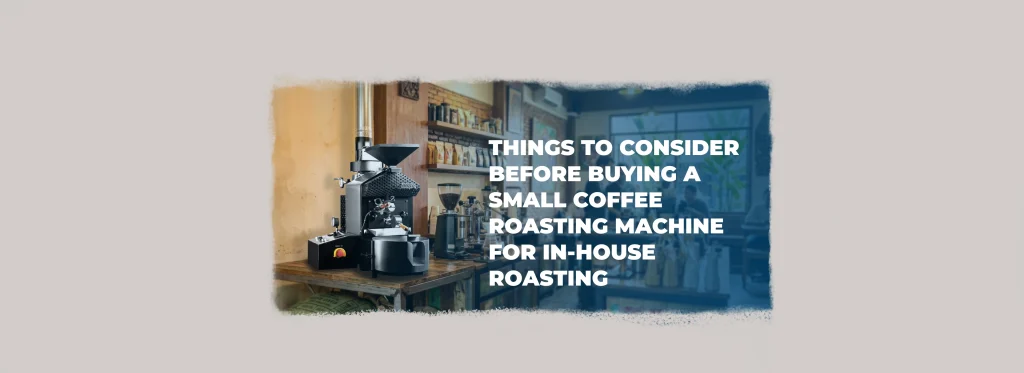 Small coffee roasting machine set up on a counter for in-house roasting inside a coffee shop.